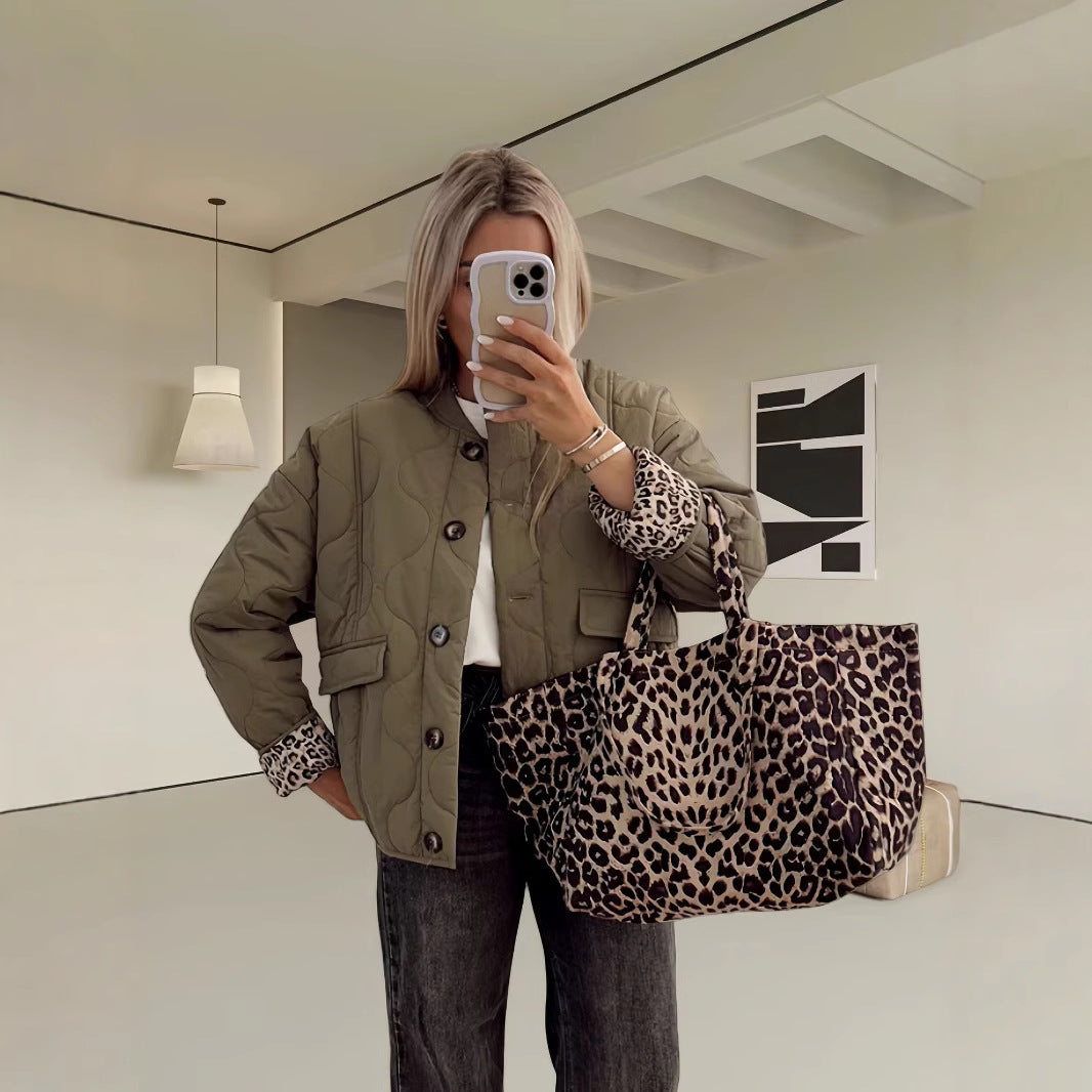 Damen gesteppte Leichtjacke mit trendigen Animal-Print-Ärmeln Merchesia