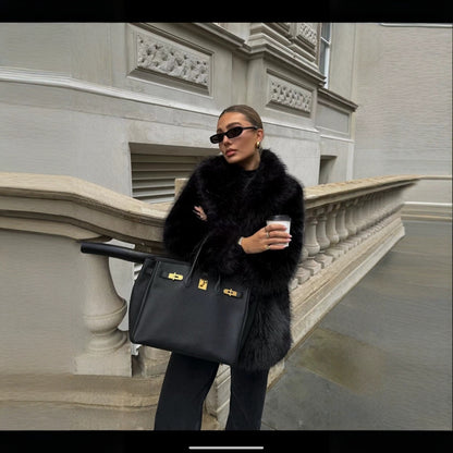 Damen Eleganter Oversized Kunstpelzmantel mit weit geschnittenen Ärmeln Merchesia