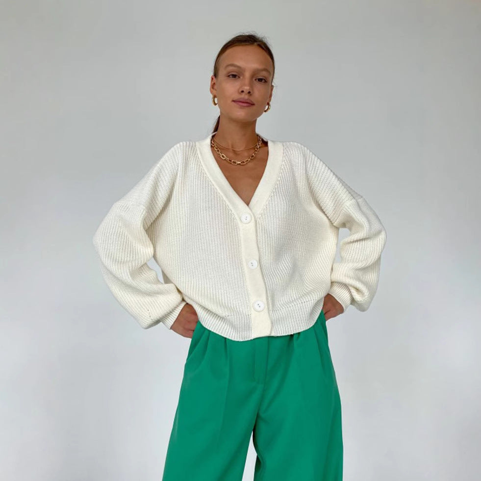 Damen kuschelige Strickjacke mit umschlagbaren Ärmeln und modischen Knopfdetails Merchesia