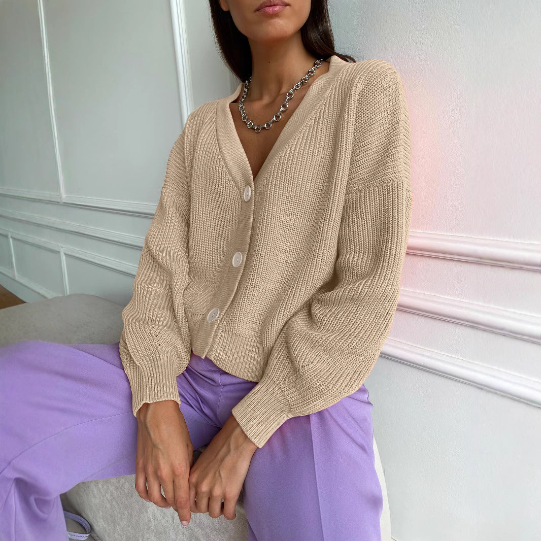 Damen kuschelige Strickjacke mit umschlagbaren Ärmeln und modischen Knopfdetails Merchesia