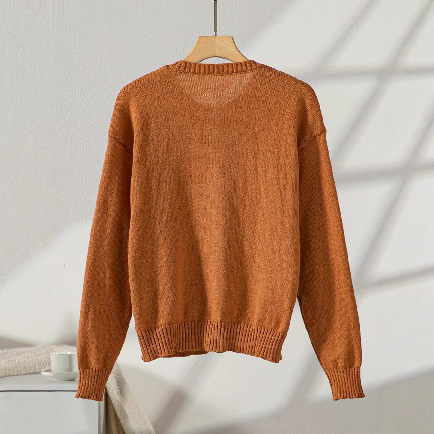 Damen elegante Strickjacke mit Knopfdetails und praktischen Taschen Merchesia