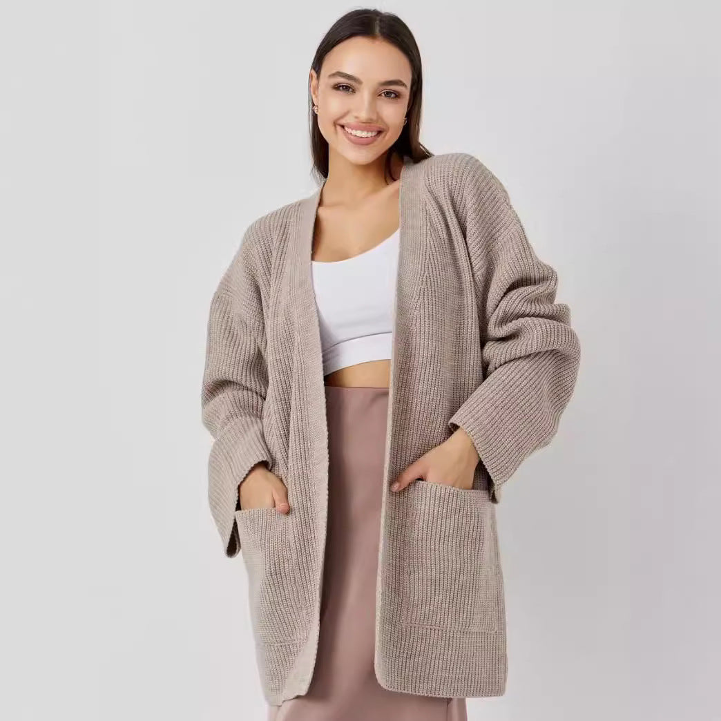 Damen Großer Strickcardigan mit voluminösen Ärmeln und praktischen Taschen Merchesia