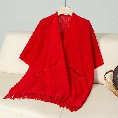 Damen eleganter Strickponcho mit fransigen Details und markantem Muster Merchesia