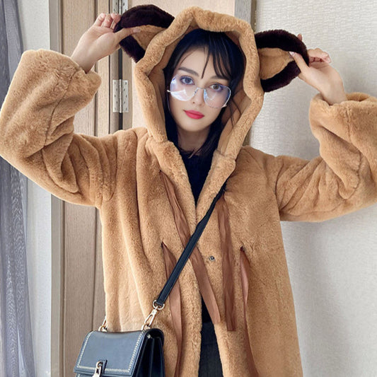 Damen Kuschelige Kunstpelzjacke mit Kapuze und Schleifendetails Merchesia