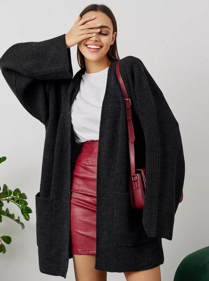 Damen Großer Strickcardigan mit voluminösen Ärmeln und praktischen Taschen Merchesia
