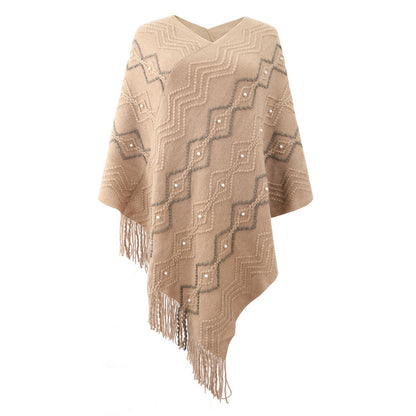Damen eleganter Poncho mit auffälligem Strukturmuster und dekorativen Fransen Merchesia