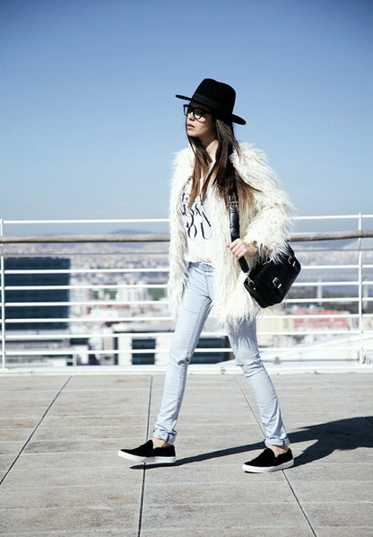 Damen Flauschiger Kunstpelzüberwurf mit großzügigem Schnitt und eleganten Ärmeln Merchesia