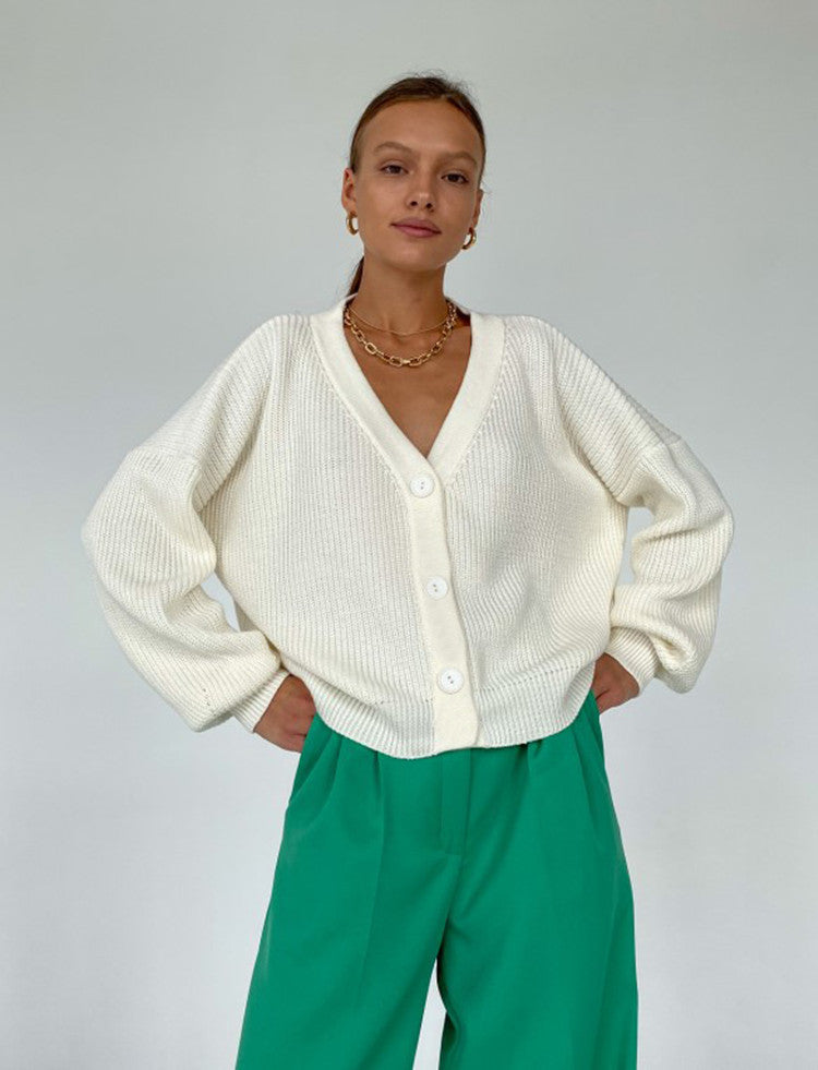 Damen kuschelige Strickjacke mit umschlagbaren Ärmeln und modischen Knopfdetails Merchesia