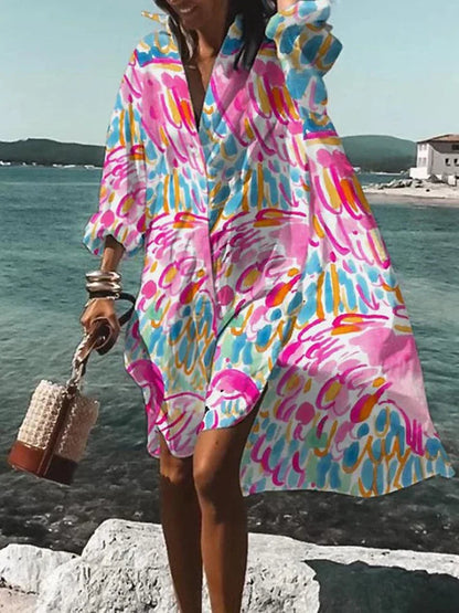 weites, farbenfrohes kleid mit sommerlichen mustern