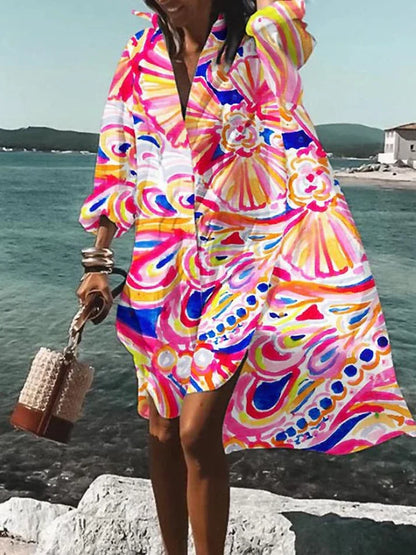 weites, farbenfrohes kleid mit sommerlichen mustern