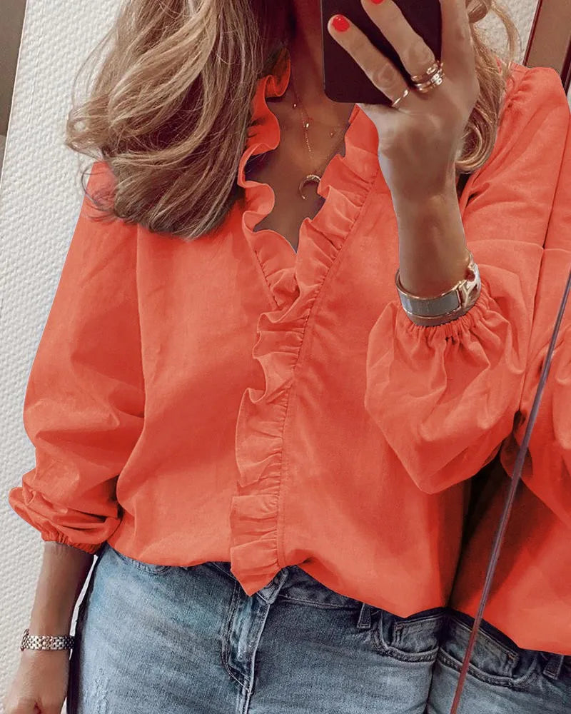 Langärmelige Bluse mit Rüschen