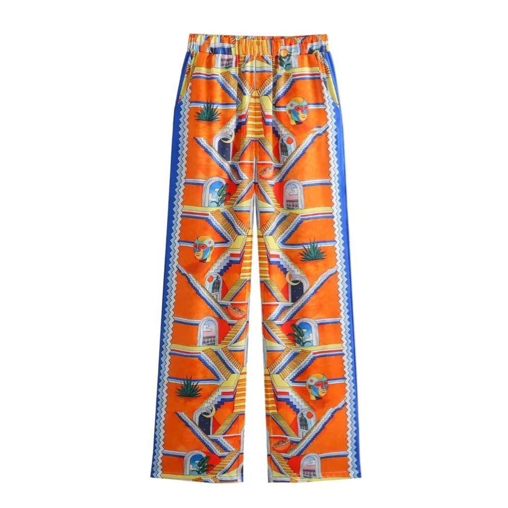 Merche - Vielseitiges Print-Shirt mit losen Revers - Weite Hose im Set