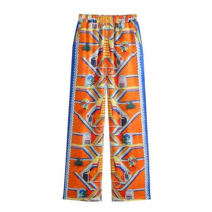 Merche - Vielseitiges Print-Shirt mit losen Revers - Weite Hose im Set
