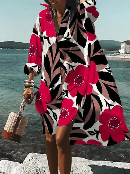 weites, farbenfrohes kleid mit sommerlichen mustern