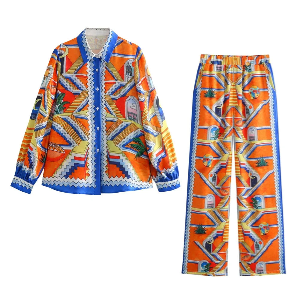Merche - Vielseitiges Print-Shirt mit losen Revers - Weite Hose im Set