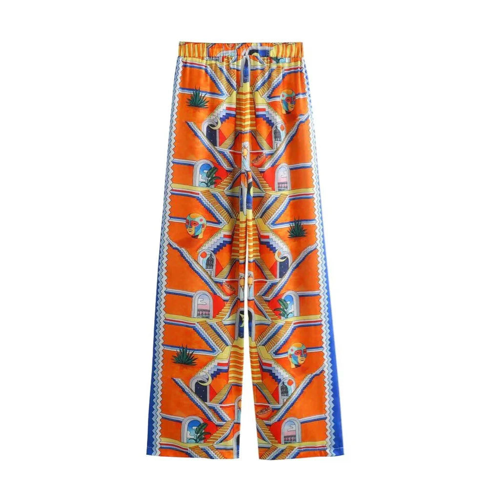 Merche - Vielseitiges Print-Shirt mit losen Revers - Weite Hose im Set
