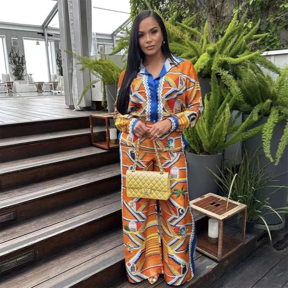Merche - Vielseitiges Print-Shirt mit losen Revers - Weite Hose im Set