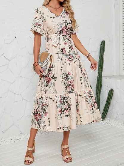 – kurzärmliges rüschenkleid mit blumendruck und v-ausschnitt