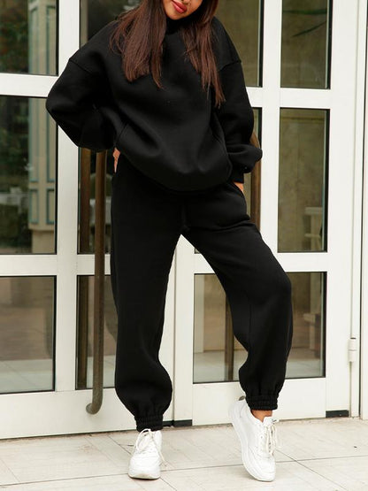 Merche einfarbiges Kapuzensweatshirt-Set mit Seitentasche