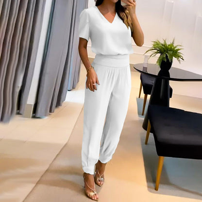 Merche zweiteiliges Set mit einem kurzärmeligen Oberteil mit V-Ausschnitt und einer langen Hose, ideal für Partys